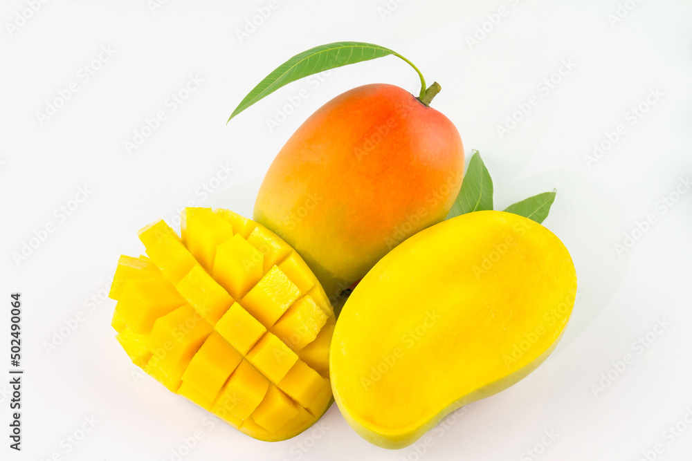 Mango fruit with mango cubes and slices. Isolated on a white background. This can be used as a business card background and can be used as an advertising image. Mango fruit with mango cubes and slices. Isolated on a white background. This can be used as a business card background and can be used as an advertising image.