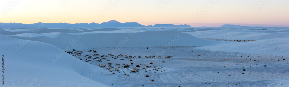 Panorama of white sand dunes at sunset in White Sands National park