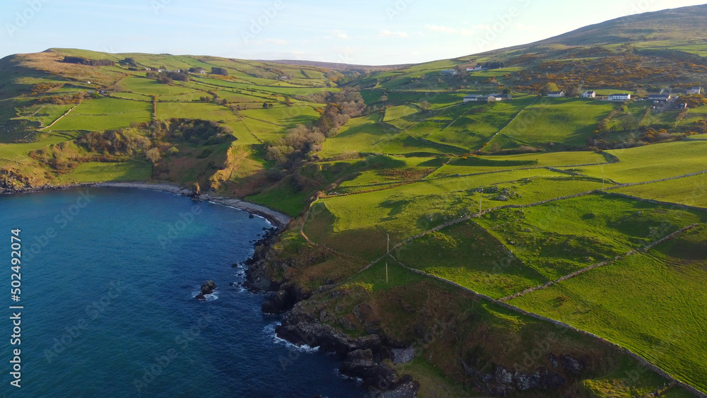 The beautiful Causeway Coast at Torre Head in Northern Ireland - aerial view by drone