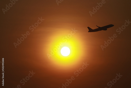 Passenger planes take off during the daytime of holidays. © stang