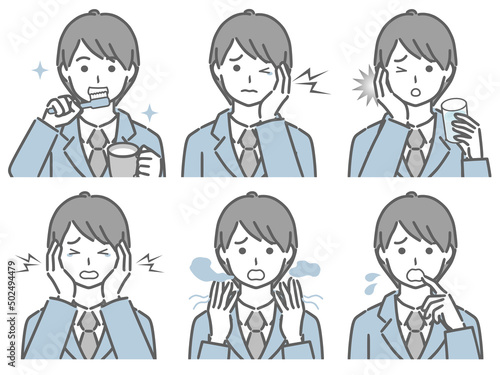 口の中に異常があるスーツの若い男性