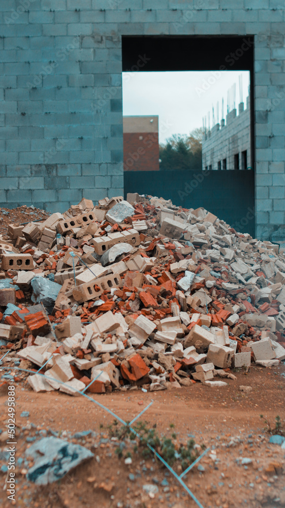 a pile of bricks on a construction site.