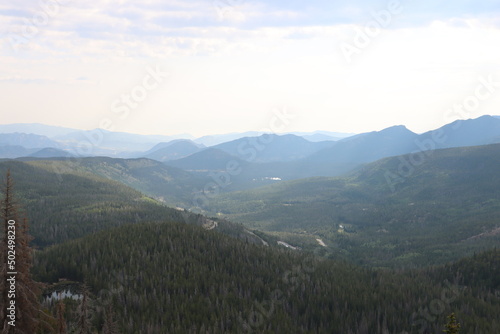 A hazy look at the landscape from Rocky Mountain National Park in Colorado as forest fires ravage the state