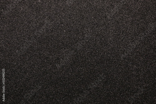 black background with textured surface