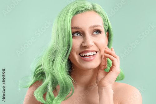 Beautiful happy young woman...