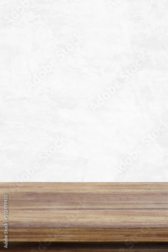 Vertical brown wood table and white cement wall background in kitchen, Wooden shelf, counter for food and product display in room background, Wood table top, desk surface banner, mockup, template