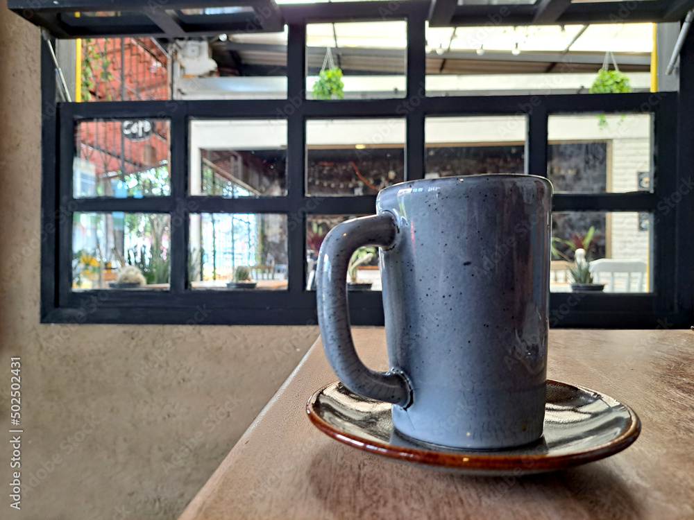 Moment of relaxation and tranquility having coffee in a place by the window with calm and peace to start the day with good morning at breakfast
Moment of relaxation and tranquility having coffee in a place by the window with calm and peace to start the day with good morning at breakfast