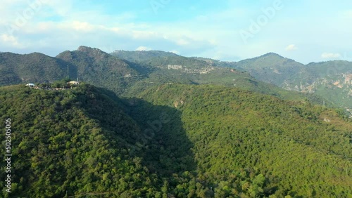 Aerial Circling The Lush Green Margala Hills And Horizon On City Outskirts - Islamabad, Pakistan photo