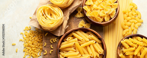 Italian pasta variety on light background.