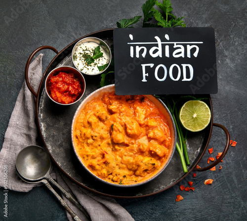 Fotografie, Obraz Indian curry on dark backgroound.
