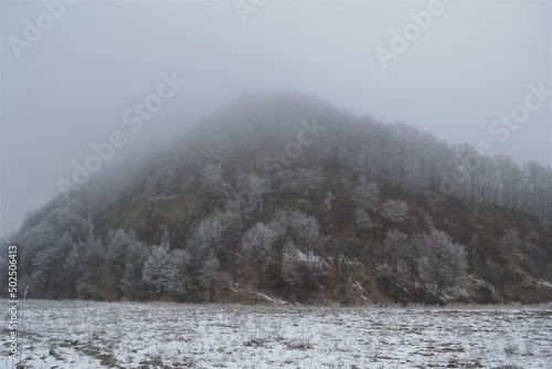 mountain in snow and fog