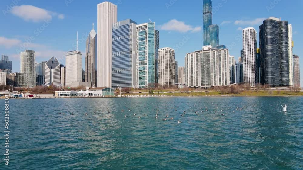 Aerial view over the lake with high-rise background, sunny, spring day, in Chicago, USA Aerial view over the lake with high-rise background, sunny, spring day, in Chicago, USA