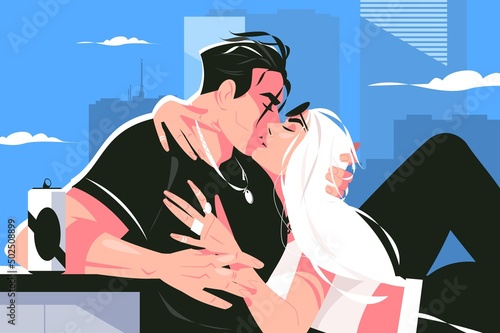 Couple kissing on building roof