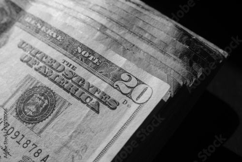 stack of twenty dollars banknotes, close up, front side