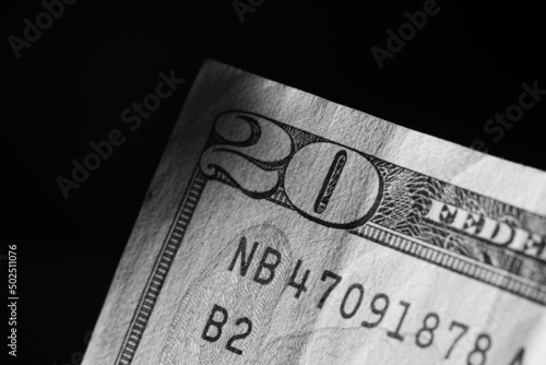 corner of banknote of stack of twenty dollars, close up, front side