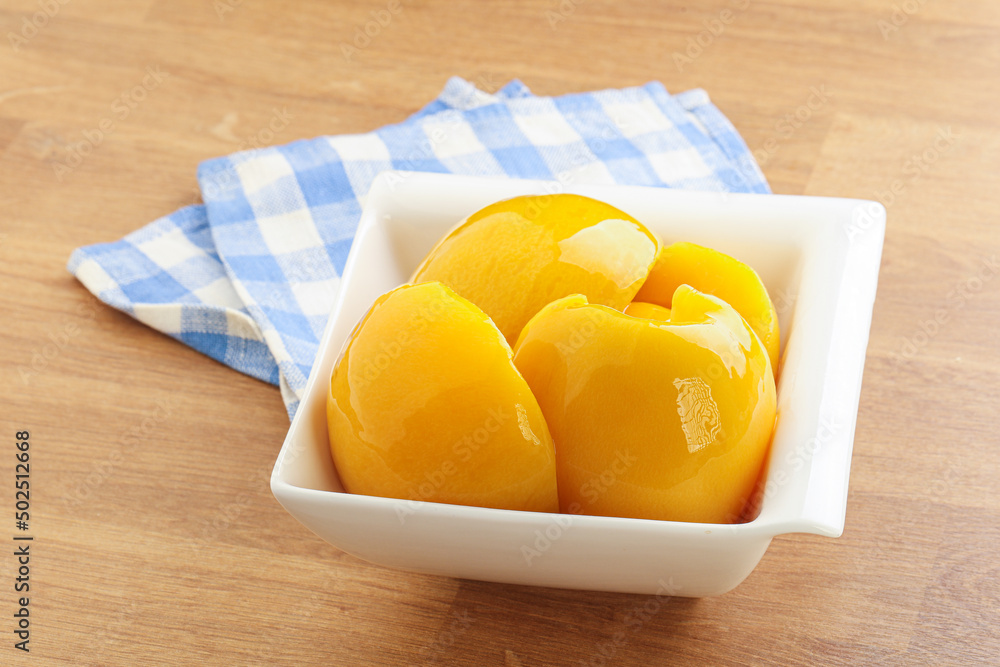 Sweet canned peaches with syrope Sweet canned peaches with syrope