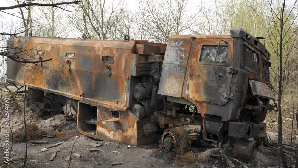 Burnt and destroyed Russian armored military truck for transporting soldiers Burnt and destroyed Russian armored military truck for transporting soldiers