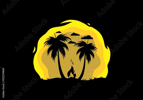 Silhouette of bonfire and coconut trees on the beach