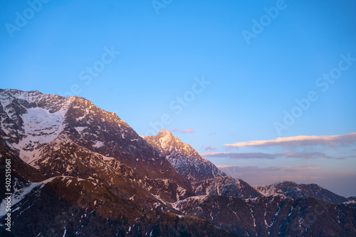 Sunset over the mountains in Triund, Himachal Pradesh, India.