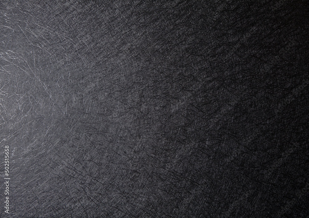 Black abstract rough scratch background with copy space for design. Black abstract rough scratch background with copy space for design.