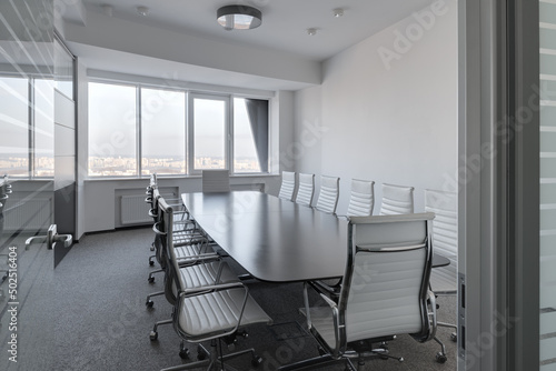 conference room, office space with large windows, modern bright office