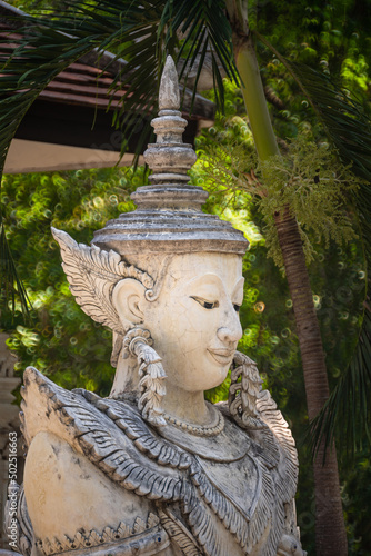 Mythological creatures statue at Wat Palad or Wat Pha Lat temple the secret hidden temples nestled in the jungle is the travel destination of Chiang Mai, Thailand. photo