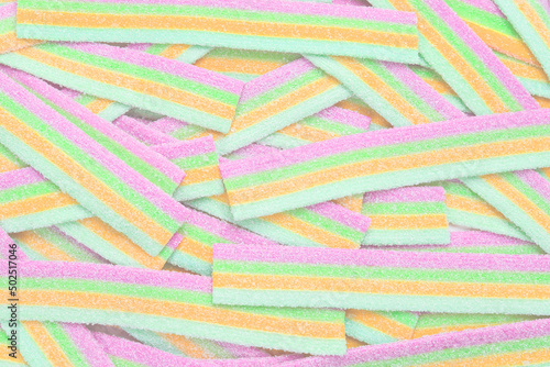 Colorful juicy gummy candies background. Top view. Jelly sweets.