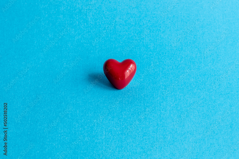 Red heart on blue background Red heart on blue background