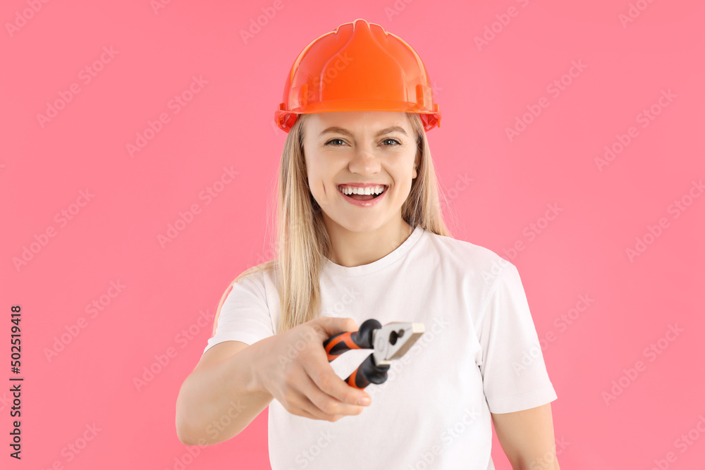 Concept of professions, young woman on pink background Concept of professions, young woman on pink background