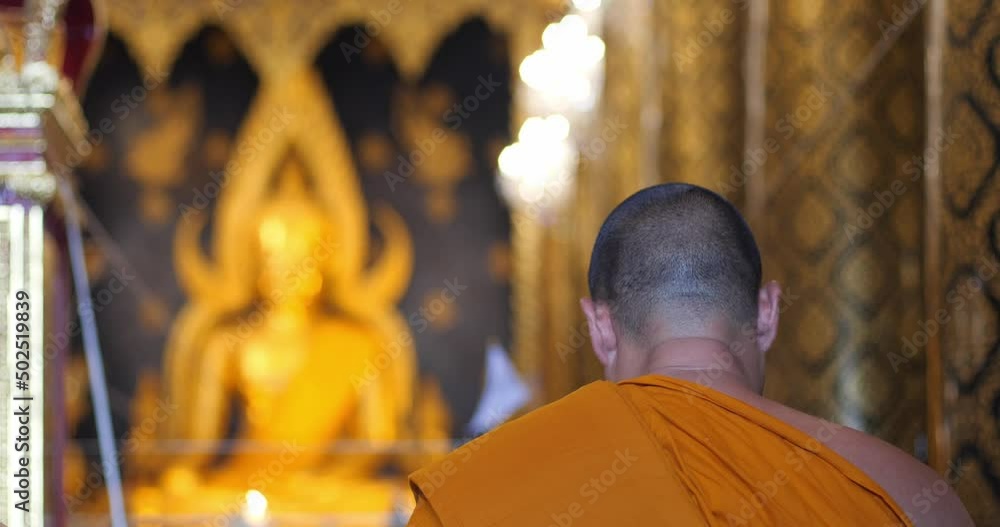 Monks are chanting a Buddhist ritual. Pray and meditation in temple, Thailand