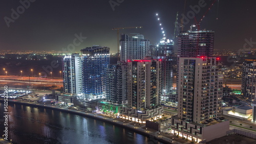 Towers at the Business Bay aerial night timelapse in Dubai, United Arab Emirates © neiezhmakov