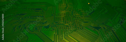 Electronic circuit board closeup. Electronic motherboard card. Circuitry and close-up on electronics. Background of electronics on board electrical circuits, technology texture.