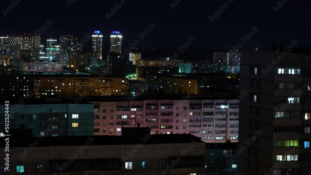 Flickering light in the windows of high-rise apartment buildings Flickering light in the windows of high-rise apartment buildings