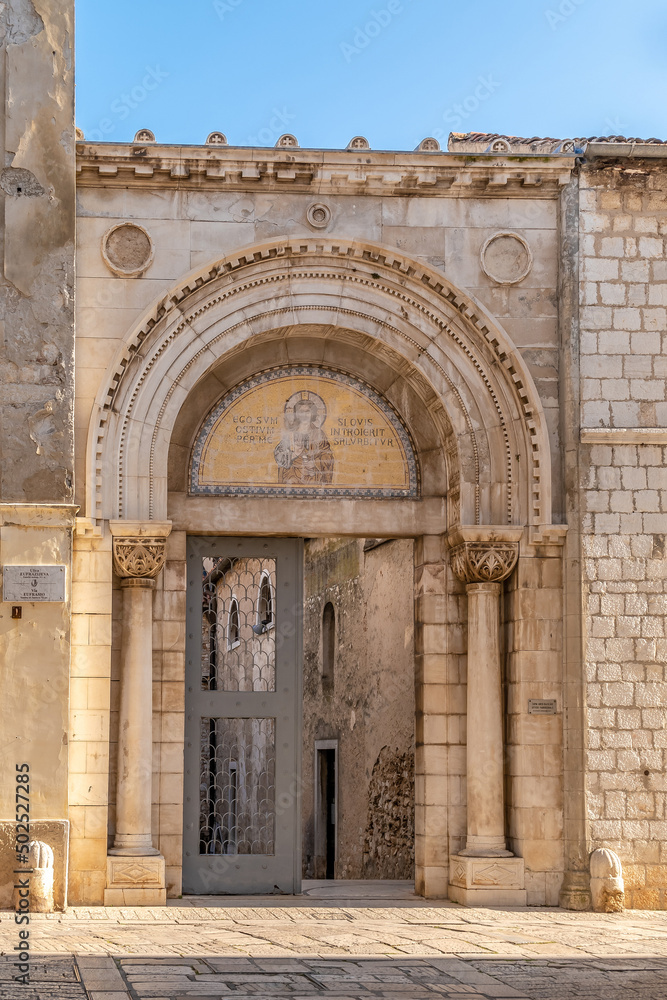Entrance gate to Euphrasian Basilica complex in the streets of Porec - Croatia