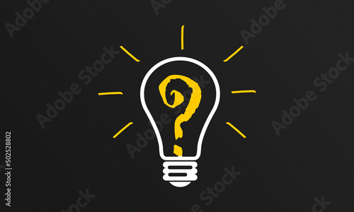 Light Bulb with Question Mark on Blackboard. Ask Questions, have ideas and success Concept 