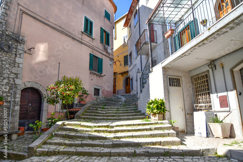 Fototapeta Naklejka Na Ścianę i Meble -  A narrow street in Morcone, a small village in Campania region, Italy.
