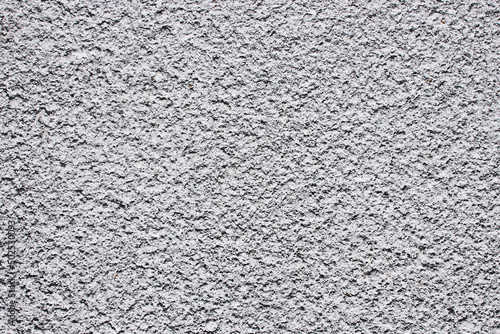 Stucco wall texture. White concrete surface background. Gray plaster wall pattern. Distressed noise backdrop for graphic design. Rough grain cement texture. Leak pattern. Overlay background.
