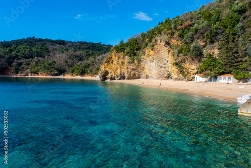 Fototapeta Naklejka Na Ścianę i Meble -  Blue water and rocks on the beach near Budva, Montenegro.
