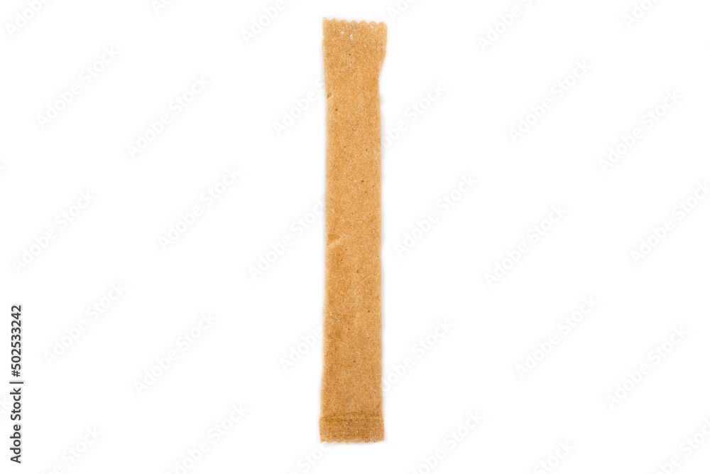 Sugar stick. Sugar in paper kraft packaging. Mock up for design isolated on white background Sugar stick. Sugar in paper kraft packaging. Mock up for design isolated on white background