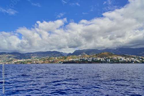 Rocky coast of Madeira with cliffs, coast of the island