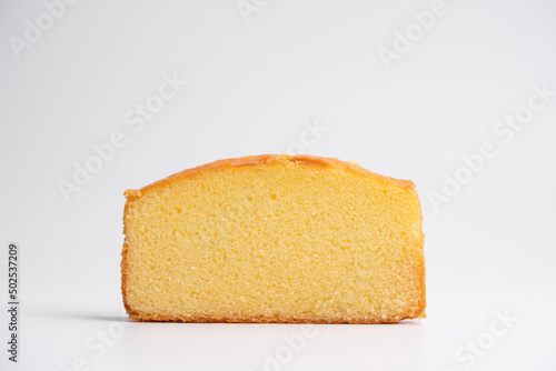 Homemade butter cake slice on isolated white background