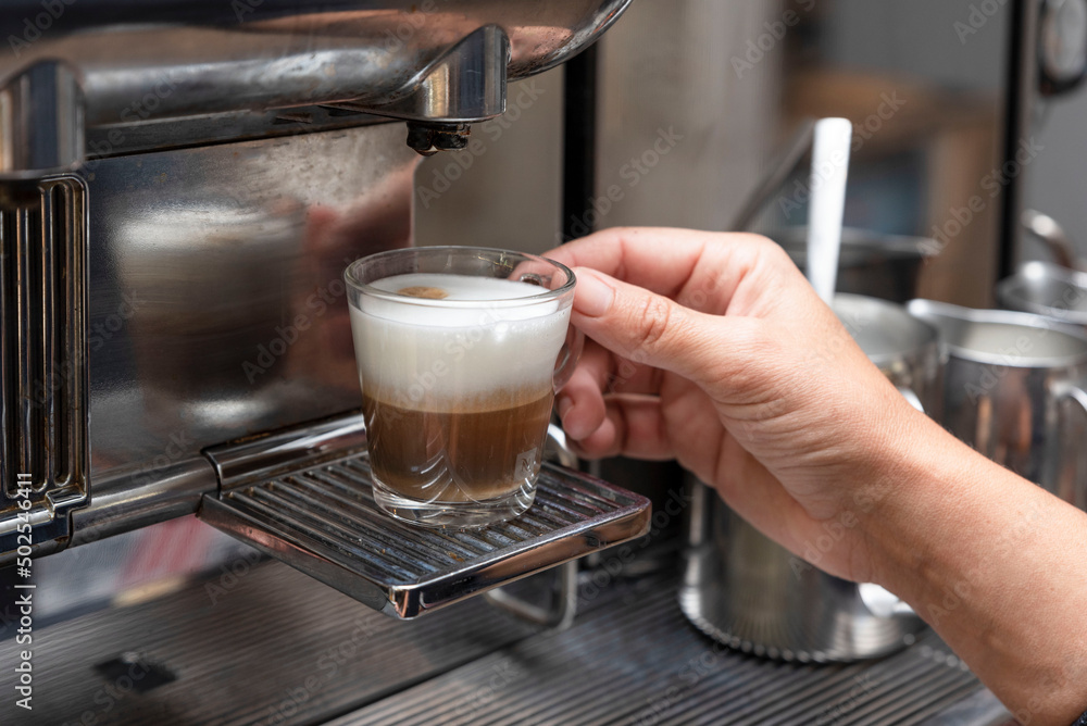 preparing coffee in the espresso machine