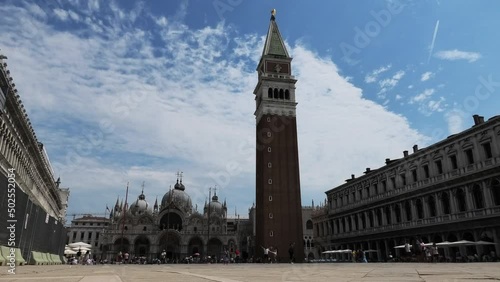 Basilica Cattedrale Patriarcale di San Marco and Campanile on San Marco piazza (square) in a very quiet Venice, Italy photo