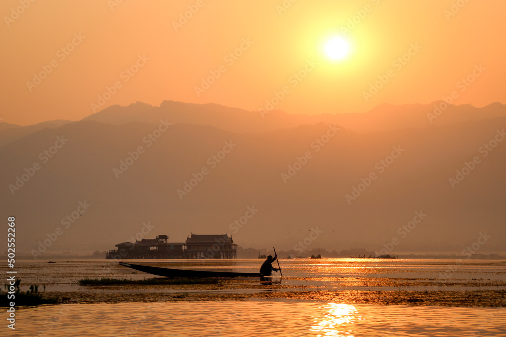  Leg-rowing fishermen at sunrise on Inle Lake Burma