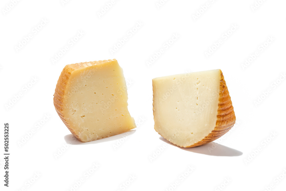 mixed of a piece of aged pecorino cheese and fresh pecorino in white background
