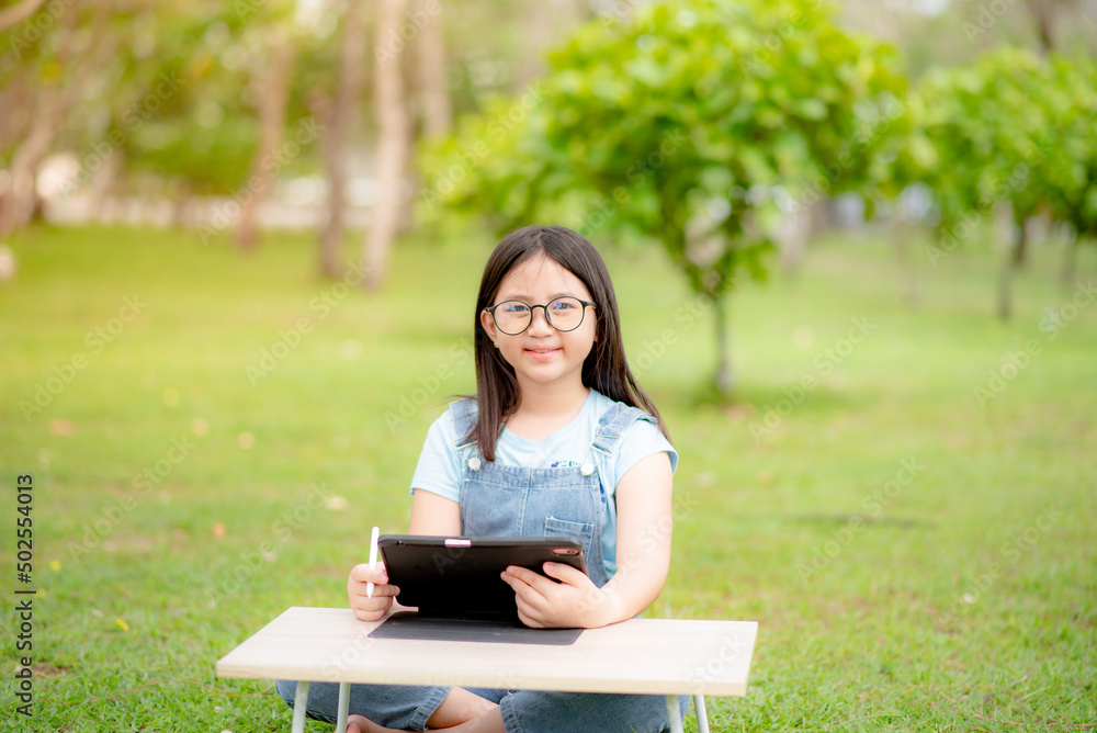 Girl studying online with tablet due to coronavirus situation
