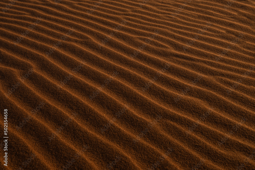 Wavy sand texture background in Namib desert Wavy sand texture background in Namib desert