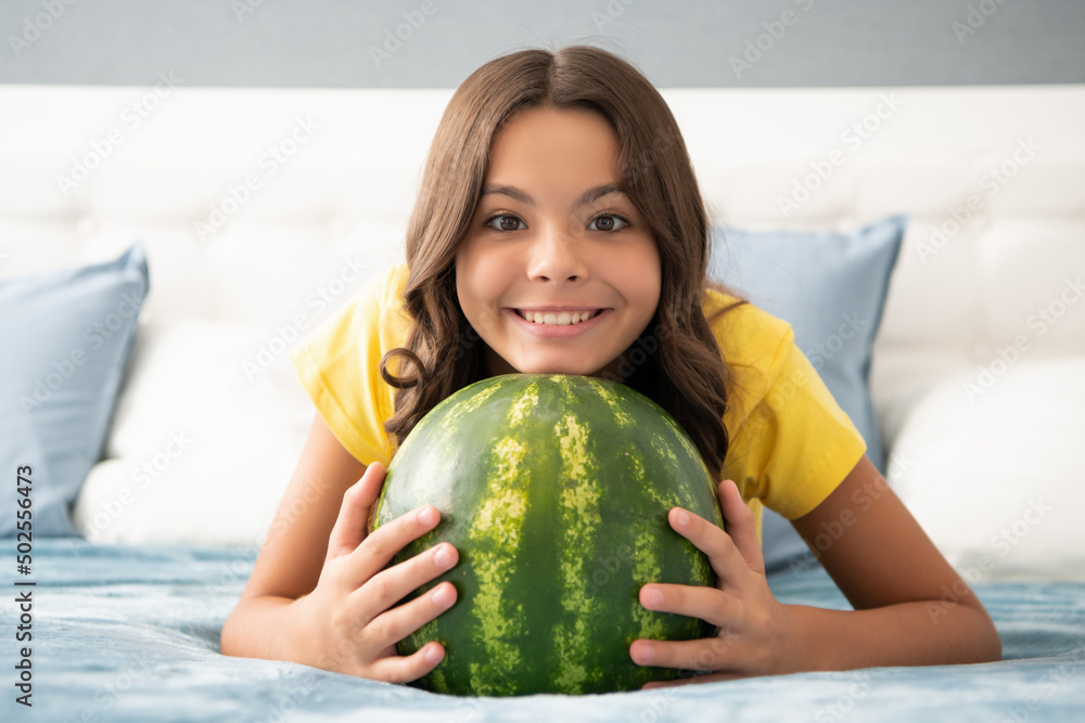 teen girl having fun. summertime. happy child hold water melon. watermelon at home. teen girl having fun. summertime. happy child hold water melon. watermelon at home.