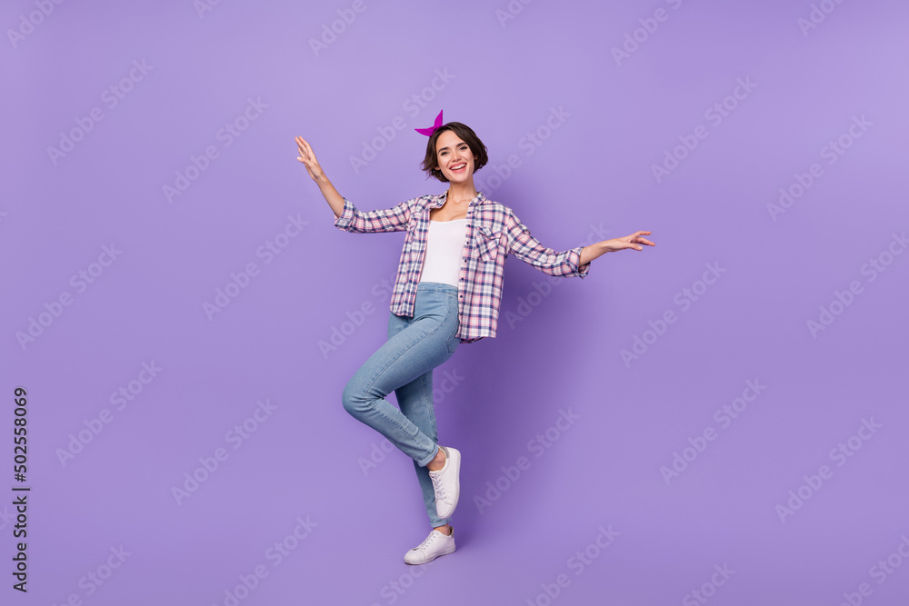 Full size profile side photo of young cheerful lovely lady good mood dance isolated over purple color background