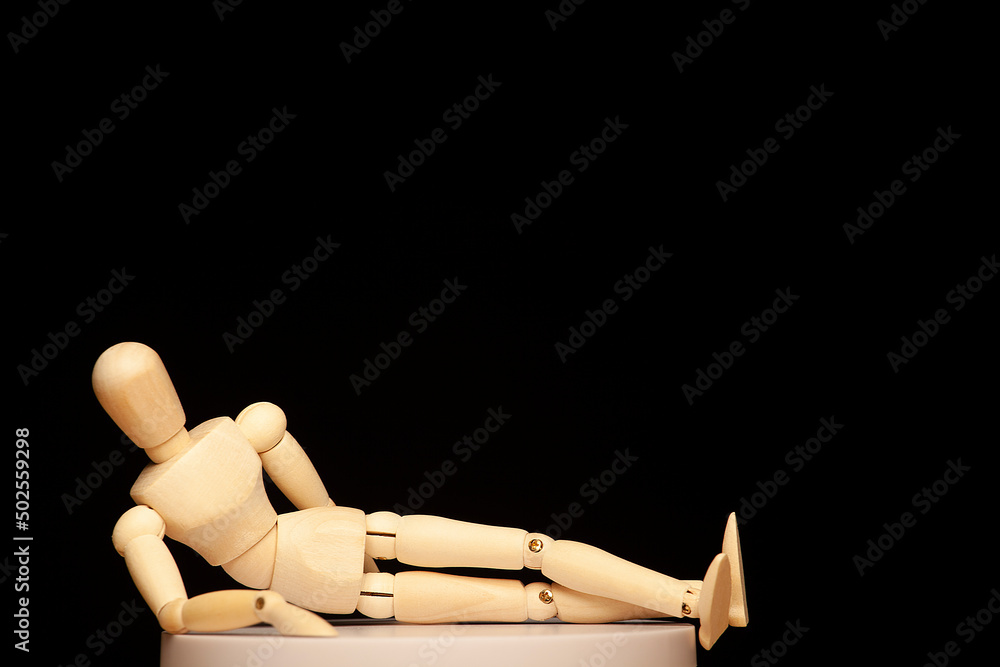 image of wooden figure dark background image of wooden figure dark background